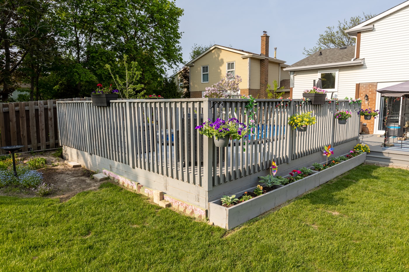 Fenced garden with planters